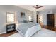 Serene main bedroom with hardwood floors, soft lighting, and ensuite access at 405 W 7Th St # 408, Charlotte, NC 28202