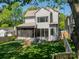 This spacious backyard features a well-maintained lawn, patio, and fenced yard with plenty of room to relax at 410 Mcalway Rd, Charlotte, NC 28211
