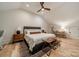 Bedroom features a bed, bedside tables, decor, overhead lighting, and a ceiling fan at 410 Mcalway Rd, Charlotte, NC 28211