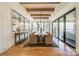 Elegant dining room with a large table, ample seating, and abundant natural light at 410 Mcalway Rd, Charlotte, NC 28211