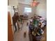 Smaller bedroom with ceiling fan and window, staged with furniture and decorations at 4230 Old Brittain Rd, Hickory, NC 28602