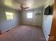 Bright bedroom with carpet, neutral paint, and ample natural light, offering a tranquil retreat for rest and relaxation at 4230 Old Brittain Rd, Hickory, NC 28602
