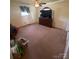 Spacious bedroom features neutral carpet, ceiling fan, and large dresser at 4230 Old Brittain Rd, Hickory, NC 28602