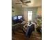Comfortable living area with wood flooring, a ceiling fan, and easy access to the outdoors, offering a relaxed ambiance at 4230 Old Brittain Rd, Hickory, NC 28602
