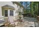Spacious deck with outdoor seating offering views of the lush backyard and shade trees at 505 Southland Rd, Huntersville, NC 28078
