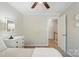 Comfortable bedroom with soft lighting, neutral tones, and access to the upstairs landing area at 505 Southland Rd, Huntersville, NC 28078