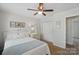 Bedroom with a ceiling fan, carpeted floor, and a closet and dresser for lots of storage at 505 Southland Rd, Huntersville, NC 28078