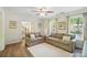 Comfortable living room with hardwood floors, neutral decor, and ample natural light at 505 Southland Rd, Huntersville, NC 28078