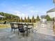 Beautiful backyard with a patio, outdoor kitchen, and a view of the pool at 5078 Hyannis Ct, Matthews, NC 28104