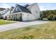 Spacious driveway leading to a three-car garage, plus a basketball hoop for outdoor fun at 5078 Hyannis Ct, Matthews, NC 28104