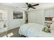 Bright bedroom with an eye-catching black and white print, built-in shelves and hardwood floors at 517 Wingrave Dr, Charlotte, NC 28270