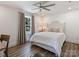 Inviting bedroom featuring hardwood floors and a nice window view at 517 Wingrave Dr, Charlotte, NC 28270