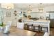 Bright and airy kitchen featuring a marble island, modern lighting, and stainless appliances at 517 Wingrave Dr, Charlotte, NC 28270