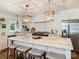 Beautiful kitchen with a marble island, pendant lighting, and stainless steel appliances at 517 Wingrave Dr, Charlotte, NC 28270