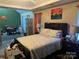 Cozy bedroom features a comfortable queen bed, soft lighting, and adjacent workspace at 5228 Sunriver Rd, Gastonia, NC 28054