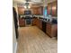 Spacious kitchen featuring stainless appliances, wooden cabinets, and tile flooring at 5228 Sunriver Rd, Gastonia, NC 28054