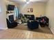 Cozy living room with fireplace, ceiling fan and comfortable seating at 5228 Sunriver Rd, Gastonia, NC 28054
