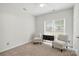 Neutral bedroom with two chairs and a small bureau at 530 Dovefield Dr, Indian Trail, NC 28079