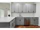 Well-lit kitchen with ample counter space, shaker cabinets, and modern stainless steel dishwasher at 530 Dovefield Dr, Indian Trail, NC 28079