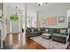 Spacious living room showcasing hardwood floors, comfortable sofa, and elegant decor at 530 Dovefield Dr, Indian Trail, NC 28079