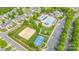 Aerial view of community amenities including a sand volleyball court and a pool at 5684 Garrow Glen Rd # 96, Charlotte, NC 28278