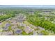 Aerial view of a beautiful neighborhood surrounded by lush green trees at 5684 Garrow Glen Rd # 96, Charlotte, NC 28278