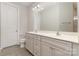 Bathroom featuring double sink vanity, tile floors, and modern fixtures at 5684 Garrow Glen Rd # 96, Charlotte, NC 28278