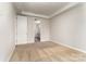 Bedroom featuring neutral walls, plush carpeting, leading to an ensuite bathroom at 5684 Garrow Glen Rd # 96, Charlotte, NC 28278