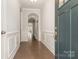 Elegant foyer with hardwood floors, arched entryway and neutral paint, creating a welcoming ambiance at 5684 Garrow Glen Rd # 96, Charlotte, NC 28278