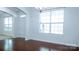 Hardwood dining area featuring natural light from a large window at 5808 Mcdowell Run Dr, Huntersville, NC 28078
