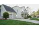 A charming home with a two-car garage and well-maintained landscaping at 5808 Mcdowell Run Dr, Huntersville, NC 28078
