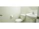 Clean half bathroom with pedestal sink and modern fixtures at 5808 Mcdowell Run Dr, Huntersville, NC 28078