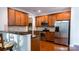 Open kitchen with granite countertops, stainless steel appliances, and ample cabinetry at 5808 Mcdowell Run Dr, Huntersville, NC 28078