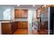 Spacious kitchen featuring stainless steel appliances, wood cabinets and granite countertops at 5808 Mcdowell Run Dr, Huntersville, NC 28078