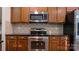 Well-equipped kitchen featuring stainless steel appliances and sleek countertops at 5808 Mcdowell Run Dr, Huntersville, NC 28078