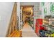 Unfinished basement with concrete walls and floors, shelves, and storage containers at 602 Shoreline Rd # 144, New London, NC 28127