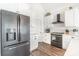 Bright kitchen with stainless steel appliances, white cabinetry and subway tile backsplash at 602 Shoreline Rd # 144, New London, NC 28127