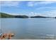 Expansive view of the serene lake with islands in the distance, creating a picturesque landscape at 602 Shoreline Rd # 144, New London, NC 28127