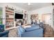 Comfortable living room featuring built-in shelving and stylish decor at 602 Shoreline Rd # 144, New London, NC 28127