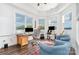 Bright home office with large windows overlooking a lake view at 602 Shoreline Rd # 144, New London, NC 28127