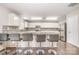 Open concept kitchen features granite countertops and seating space at 6618 Latherton Ln, Charlotte, NC 28278
