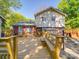 Backyard featuring a wooden deck and lawn at 6820 Elm Forest Dr, Charlotte, NC 28212