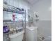 Bathroom features a sink and a shower, with tiled walls at 6820 Elm Forest Dr, Charlotte, NC 28212