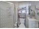 Compact bathroom with shower, standard toilet, single sink, and window at 6820 Elm Forest Dr, Charlotte, NC 28212