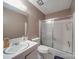 Standard bathroom with white fixtures, including a shower-tub combo and single-sink vanity at 6820 Elm Forest Dr, Charlotte, NC 28212