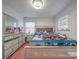 Bedroom features a silver bed frame, mirrored dresser, and hardwood floors at 6820 Elm Forest Dr, Charlotte, NC 28212