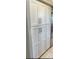 Kitchen featuring modern white cabinets with sleek, silver hardware at 7067 Rocky Falls Rd, Charlotte, NC 28211