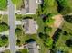 Aerial view of a property highlighting its well-maintained lawn and surrounding trees at 709 Circle Trace Rd, Monroe, NC 28110
