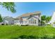 A spacious backyard featuring a manicured lawn, a white fence, and plenty of open space at 709 Circle Trace Rd, Monroe, NC 28110