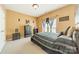 Comfortable bedroom with beige walls, neutral carpet, and stylish furniture at 709 Circle Trace Rd, Monroe, NC 28110